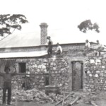 W. Flugge, F.H. Flugge, C.H. Flugge, W. Longmire, M.H. Longmire, adding the iron roof to the new supper room.